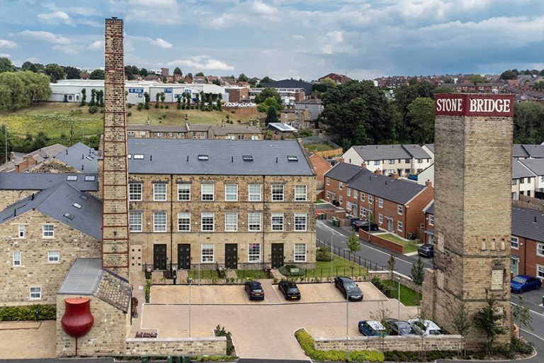 Construction of new “heritage village” completes at Leeds mill